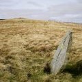 Boundary stone and the summit of Rhos