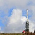 The Wrekin, walkers, mast and trig point