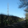 Transmitter mast above the road on Bulbarrow Hill