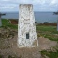 Trig pillar and cable car pylons, summit of the Great Orme