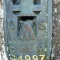 Bench mark on the Caton Moor trig pillar