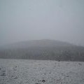 Dun Garbh barely visible during a blizzard