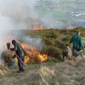 Lighting the Windward edge to complete the controlled burn