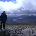 Willie on summit of Beinn Eibhinn with Loch Ossian in view.